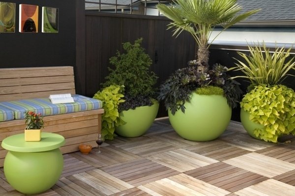 planters-ideas-wooden-floor-green-flower-pots-attractive-balcony