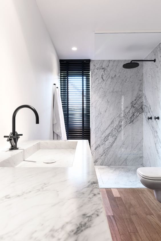 Bathroom with Marble clad walls