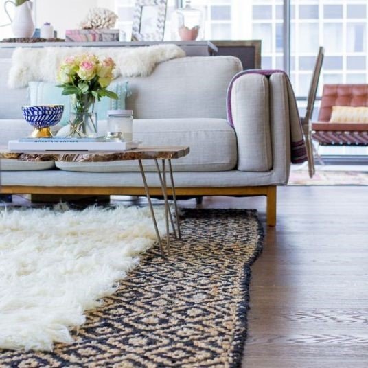 Layer rugs in living room decor
