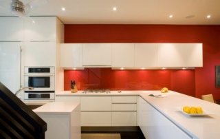 modern kitchen with white acrylic kitchen cabinets